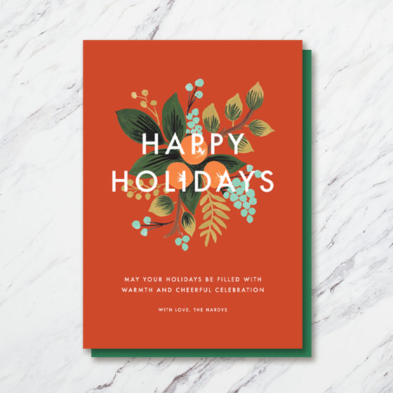 Custom Holiday Card that says Happy Holidays with ornate flowers designed behind the text